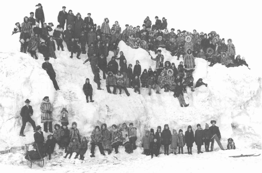 School faculty and pupils on hummock. School pupils of Nome Public School, on Bering Sea, April 19, 1910. 
