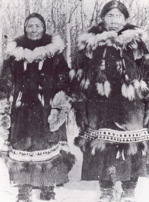Two Athapascan native women in  winter wear